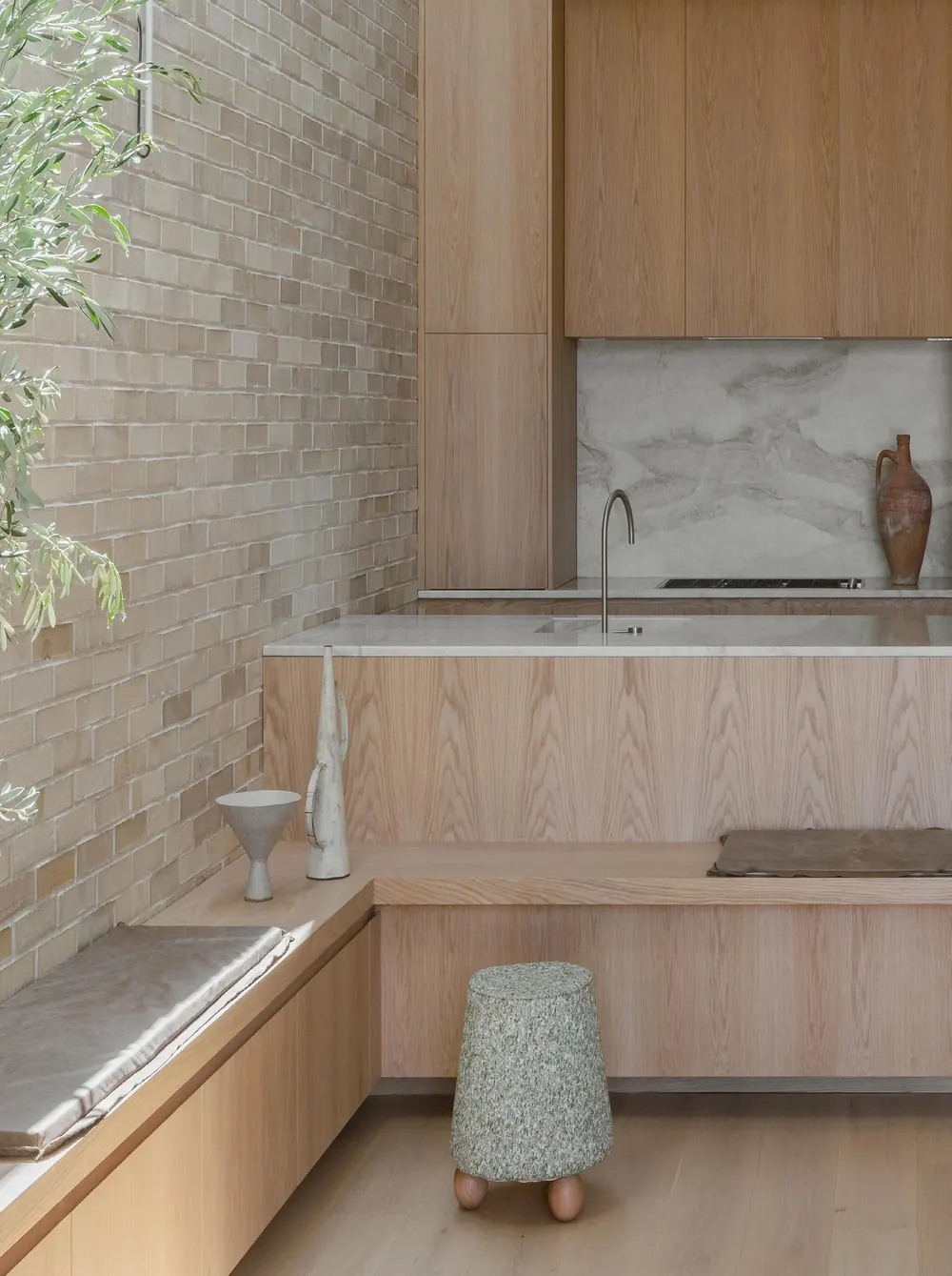 Timber joinery and stone detailing in a CM Studio kitchen